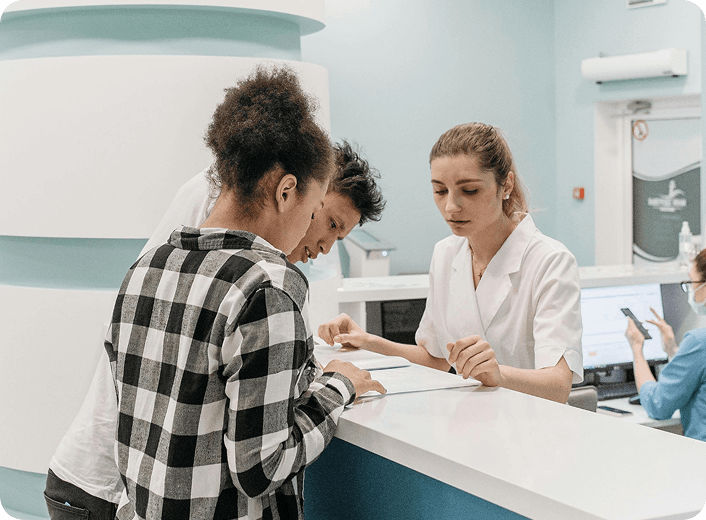 Doctor having video consultation with patient on laptop